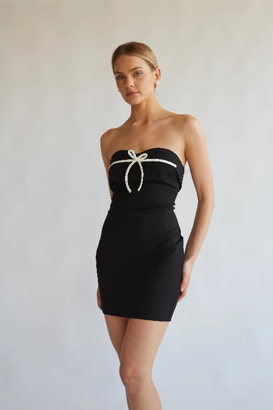 Mini dresses with asymmetric hems for a fashion - forward look Eloise Strapless Bow Bodycon Mini Dress Mini dresses with asymmetric hems for a fashion - forward look Eloise Strapless Bow Bodycon Mini Dress