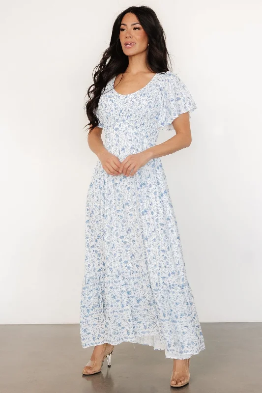 Midi dresses with printed lining for a hidden and stylish detail Joanie Smocked Dress | White + Blue Floral Midi dresses with printed lining for a hidden and stylish detail Joanie Smocked Dress | White + Blue Floral