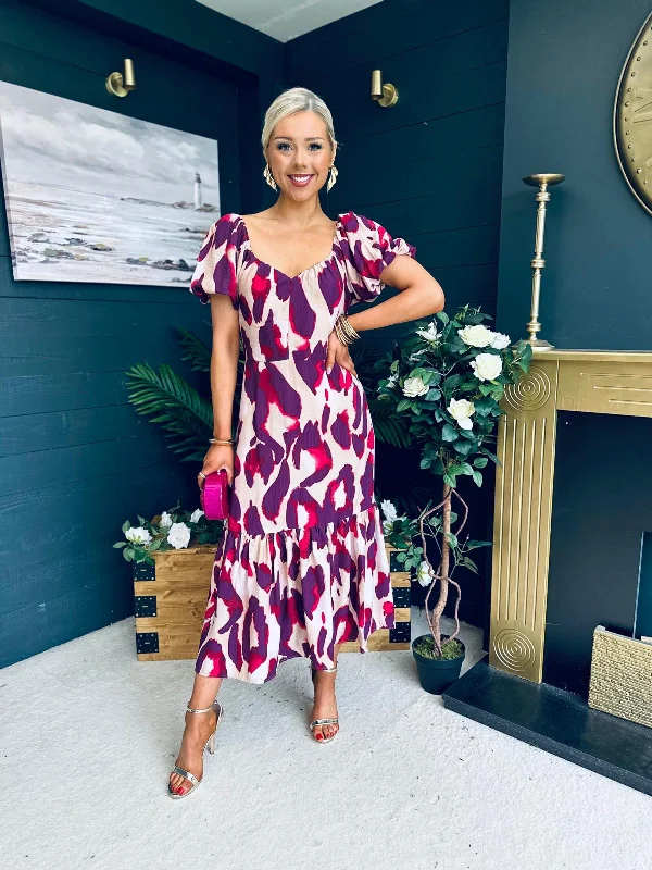 Midi dresses with ruched bodices for a feminine and fitted feel Baylor Animal Print Puff Sleeve Smock Dress Cream & Purple Midi dresses with ruched bodices for a feminine and fitted feel Baylor Animal Print Puff Sleeve Smock Dress Cream & Purple