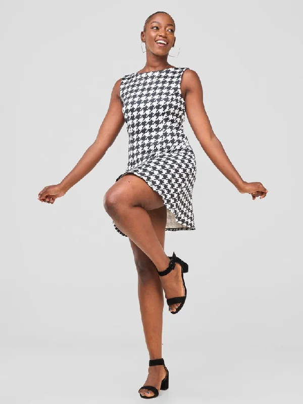 Mini dresses with pom - pom trims for a playful feel Zoya Sitawi A-line Mini Dress - Black / White Abstract Print Mini dresses with pom - pom trims for a playful feel Zoya Sitawi A-line Mini Dress - Black / White Abstract Print