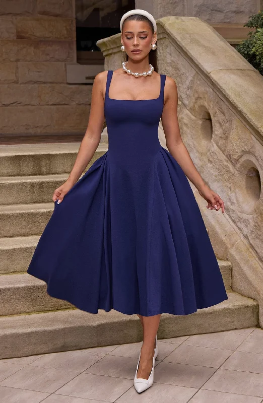 Midi dresses with embroidered accents for a unique and detailed design Betty Midi Dress - Navy Midi dresses with embroidered accents for a unique and detailed design Betty Midi Dress - Navy