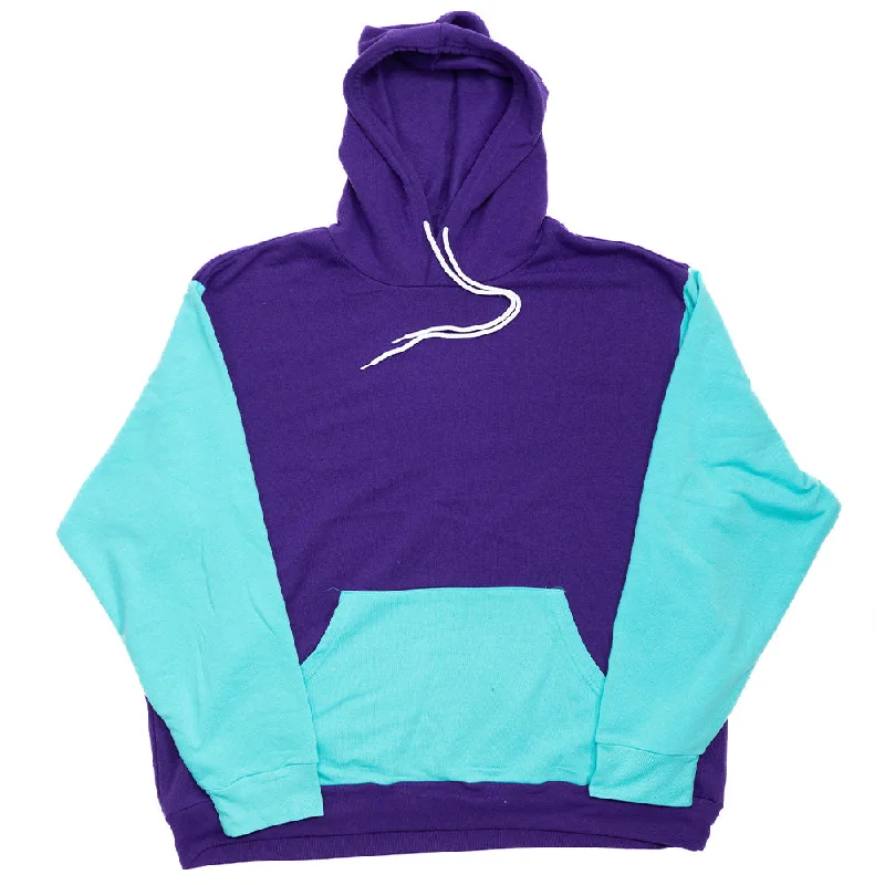 Women's graphic - printed sweatshirt featuring floral patterns for a feminine touchPurple and Teal Color Block Giant Hoodie Women's graphic - printed sweatshirt featuring floral patterns for a feminine touchPurple and Teal Color Block Giant Hoodie