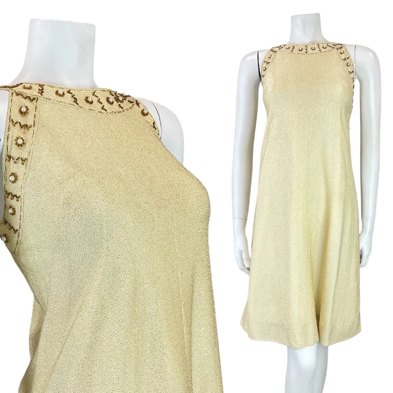Mini Women Dress with a Short Hem for a Young and Trendy Style Mini Women Dress with a Short Hem for a Young and Trendy Style VINTAGE 60s 70s GOLD BEADED MOD DISCO STUDIO 54 PARTY SLEEVELESS SHIFT DRESS 10