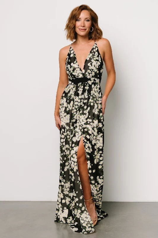 Maxi dresses with fringe trim for a bohemian vibeBrylee Maxi Dress | Black Flower Print Maxi dresses with fringe trim for a bohemian vibeBrylee Maxi Dress | Black Flower Print