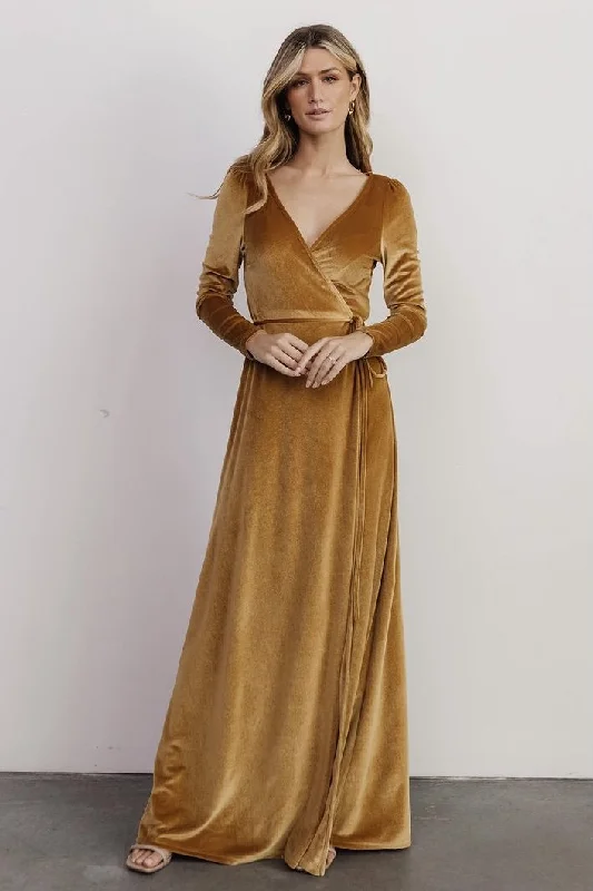 Maxi dresses with pom - pom trims for a playful and festive lookEsmerelda Velvet Wrap Maxi Dress | Gold Maxi dresses with pom - pom trims for a playful and festive lookEsmerelda Velvet Wrap Maxi Dress | Gold