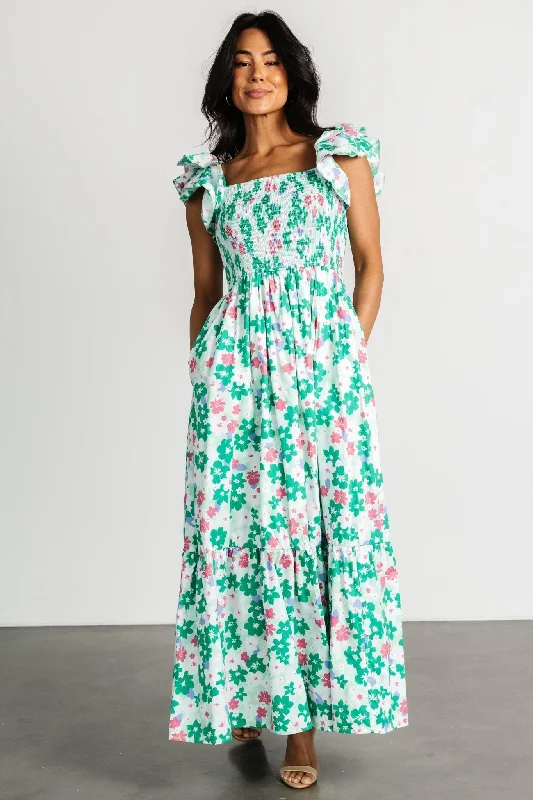 Metallic maxi dresses for a glamorous New Year's Eve partyLaguna Smocked Maxi Dress | Green Floral Metallic maxi dresses for a glamorous New Year's Eve partyLaguna Smocked Maxi Dress | Green Floral