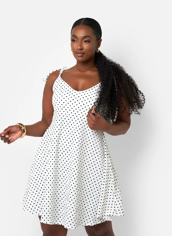 Midi dresses with ruffled bodices for a more pronounced feminine lookCassidy Polka Dot Tie Strap Miini A Line Dress - White & Black Midi dresses with ruffled bodices for a more pronounced feminine lookCassidy Polka Dot Tie Strap Miini A Line Dress - White & Black