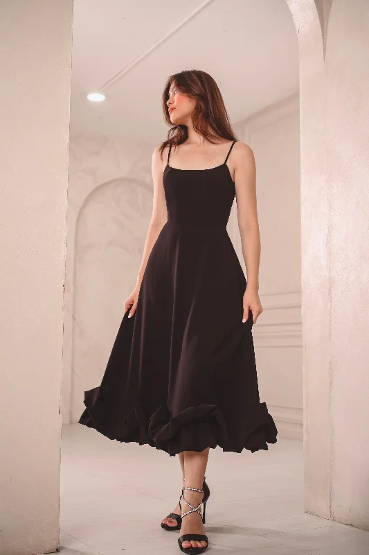 Midi dresses with ribbed textures for a unique and tactile appearanceEmmanuela