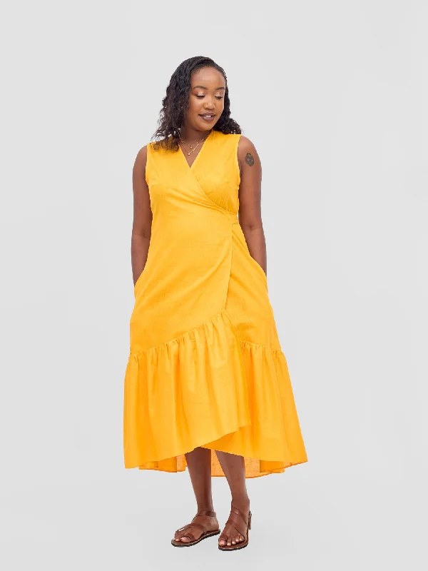 Midi dresses with printed lining for a hidden and stylish detailSafari Savannah Midi Wrap Dress - Mustard Midi dresses with printed lining for a hidden and stylish detailSafari Savannah Midi Wrap Dress - Mustard
