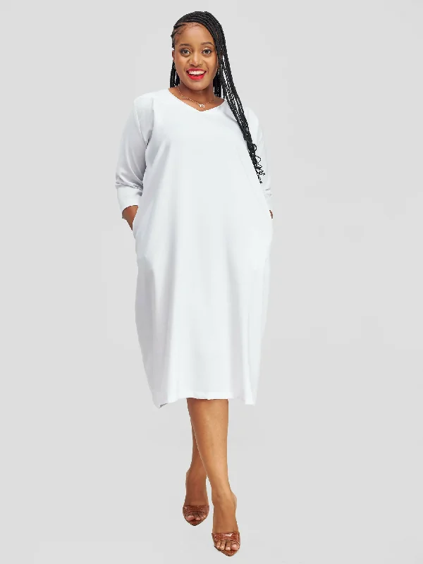 Midi dresses with button - down skirts for a unique and functional designTimyt Urban Wear Elegance Dress / V-neck/3/4 sleeved - White Midi dresses with button - down skirts for a unique and functional designTimyt Urban Wear Elegance Dress / V-neck/3/4 sleeved - White
