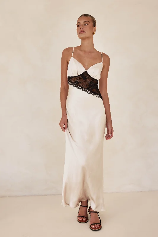 Maxi dresses with a criss - cross back for a flirty and unique detailEryn Maxi Dress (Champagne) Maxi dresses with a criss - cross back for a flirty and unique detailEryn Maxi Dress (Champagne)