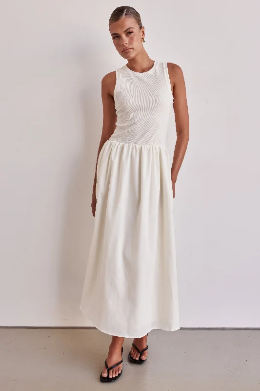 Maxi dresses with tassel accents for a fun and lively touchReign Maxi Dress (Cream)