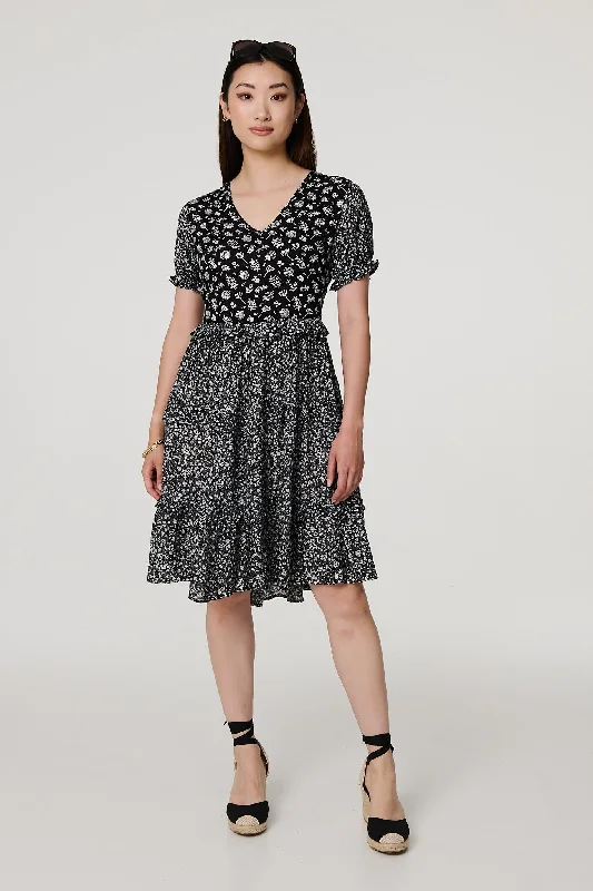 Mini dresses with cold - shoulder designsFloral Short Sleeve Tiered Skater Dress