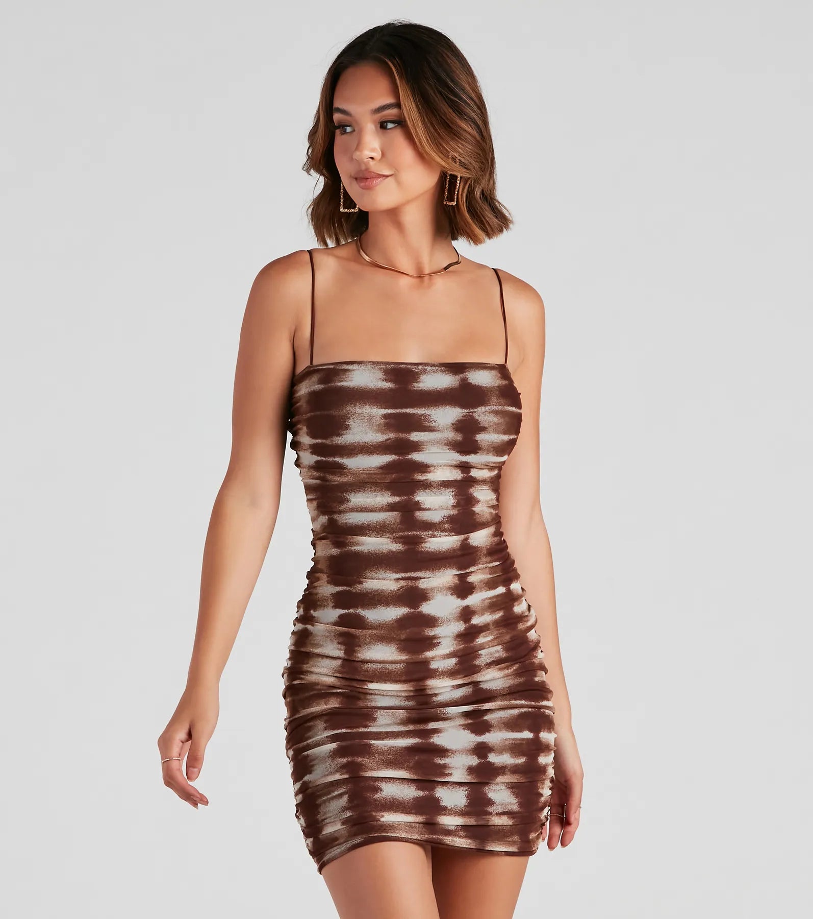 Mini bodycon dress for a night out on the town​A Trendy Fave Mesh Mini Dress