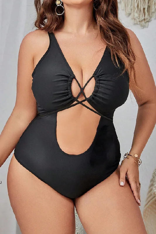 Women's Sleeveless Backless One - Pieces in Black with Cut - Out Details for a Sexy Beach LookPlus Size Black Solid Color Lace Up Cut Out One Piece Swimsuit Women's Sleeveless Backless One - Pieces in Black with Cut - Out Details for a Sexy Beach LookPlus Size Black Solid Color Lace Up Cut Out One Piece Swimsuit